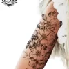 tatouage-bras-ephemere-femme-fleur-elegant-discret