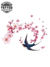 tatouage-oiseau-ephemere-cerisier-design-nature-intemporel tatouage-oiseau-ephemere-cerisier-design-nature-intemporel