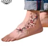 tatouage cheville ephemere branche delicate