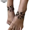 tatouage-cheville-ephemere-fleurs-elegant-feminin tatouage-cheville-ephemere-fleurs-elegant-feminin