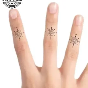 tatouage-doigt-ephemere-boussole-art-corporel-temporaire-orientation-style tatouage-doigt-ephemere-boussole-art-corporel-temporaire-orientation-style