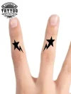 tatouage-ephemere-doigt-etoile-decoration-temporaire-tatouage-doigt tatouage-ephemere-doigt-etoile-decoration-temporaire-tatouage-doigt