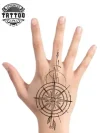 tatouage-main-ephemere-boussole-directionnelle tatouage-main-ephemere-boussole-directionnelle
