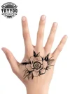 tatouage-main-fleur-delicate-ephemere tatouage-main-fleur-delicate-ephemere