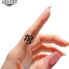 tatouage-ephemere-doigt-design-om-decoration-temporaire-pour-doigts tatouage-ephemere-doigt-design-om-decoration-temporaire-pour-doigts