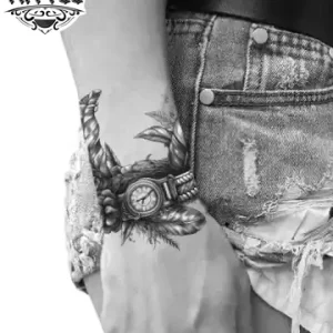 tatouage-poignet-ephemere-plume-stylisee tatouage-poignet-ephemere-plume-stylisee