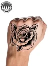 tatouage-main-homme-ephemere-rose-elegant tatouage-main-homme-ephemere-rose-elegant
